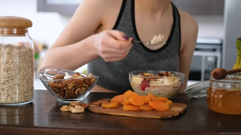 young woman eating a healthy oat